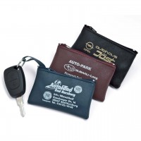 Schlüsseltasche aus farbigem Kunstleder Schlüsseltasche aus farbigem Kunstleder