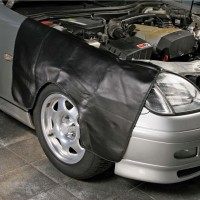 Kotflügelschoner mit Sandgewichten Kotflügelschoner mit Sandgewichten