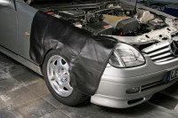 Kotflügelschonermit eingearbeiteten Sandgewichten Kotflügelschonermit eingearbeiteten Sandgewichten